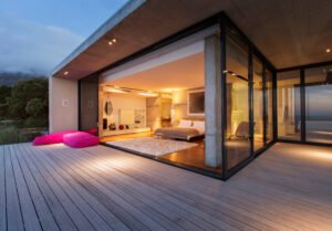 Sliding glass doors onto bedroom of modern house